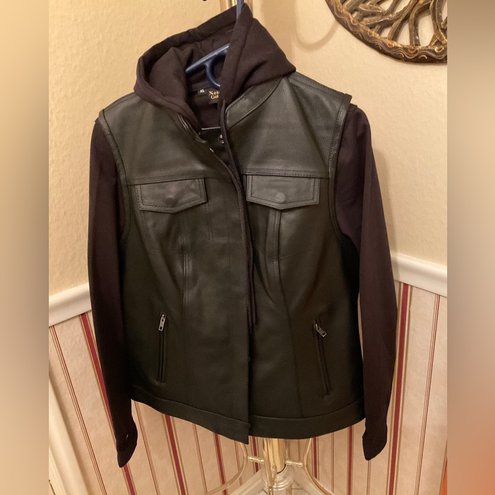 Xelement "Tara" black leather hoodie jacket with convertible vest.